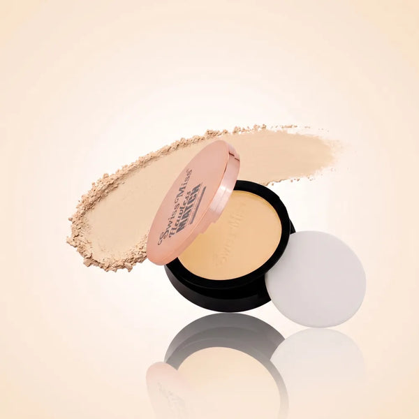 Swiss Miss Flawless Match compact powder in shade SM 03 Natural Beige with rose gold lid, application sponge, and natural beige face powder swatch.