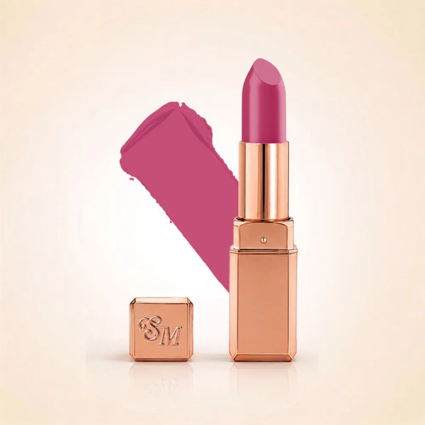 Swiss Miss Silk Lipstick in shade Fuchsia (719) in gold bullet packaging shown alongside a textured cream color swatch.