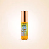 A roll-on body mist bottle with a metallic rose gold cap and a label that reads 'Swiss Mist BODY MIST' and 'Sweet Cherry' in gold script, set against a light beige background.