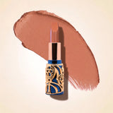 Swiss Miss Bling Lipstick in shade Soft Brown B-101 featuring ornate blue and gold filigree bullet tube casing with a soft nude brown lipstick swatch.