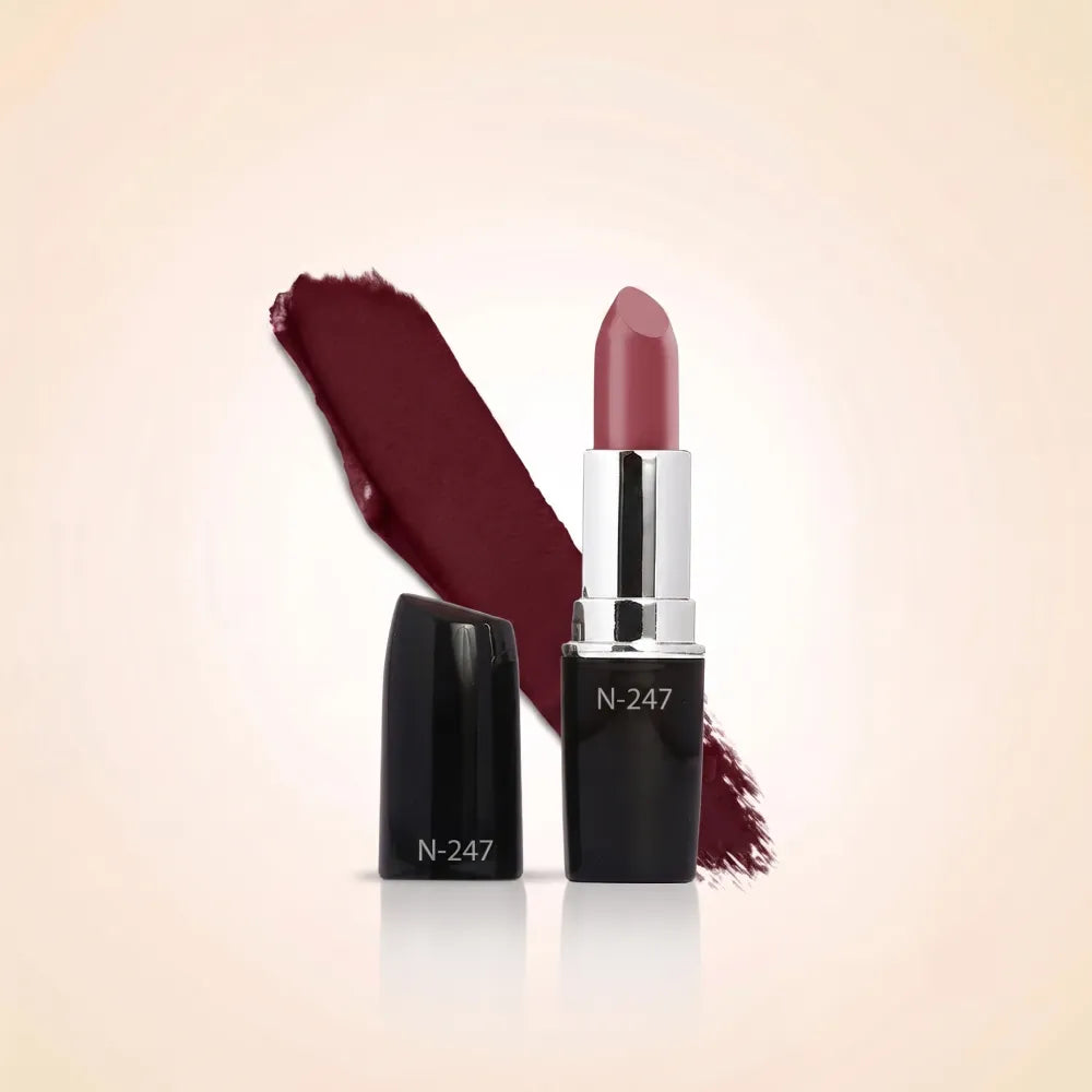 Swiss Miss Classic Lipstick in shade Blossom Pink M-247 featuring black bullet tube labeled N-247 with silver casing and a dark berry rose lipstick swatch.