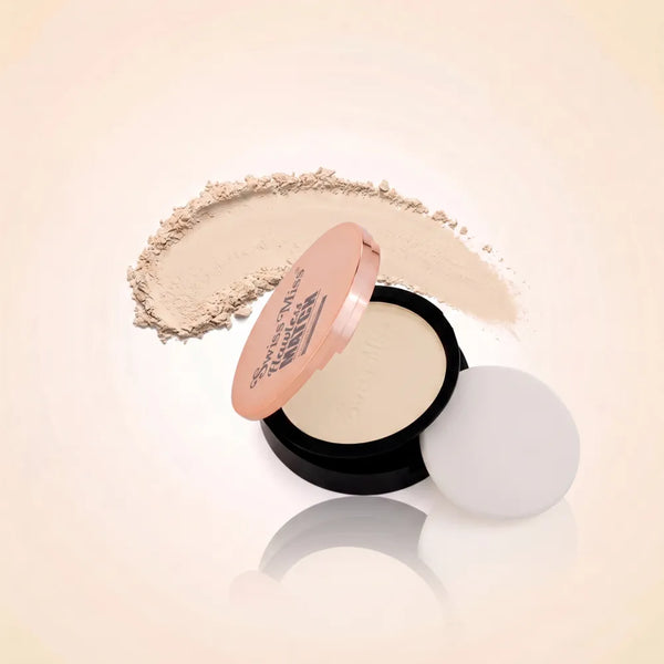Swiss Miss Flawless Match compact powder in shade SM 01 Light Ivory with rose gold lid, application sponge, and light face powder swatch.