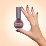 Swiss Miss Get Set Go Quick Dry Nail Enamel in shade Moonless Nite 234 held by hand showing round glass bottle with shimmering metallic smoky plum brown polish and matching manicured nails.