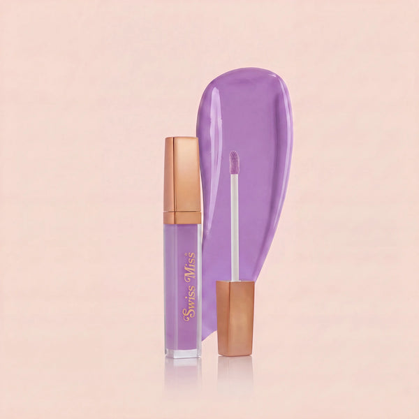 Swiss Miss High Shine Lip Gloss in shade 109 Lilac Haze featuring rose gold cap, applicator wand, and soft lilac purple lip gloss swatch.