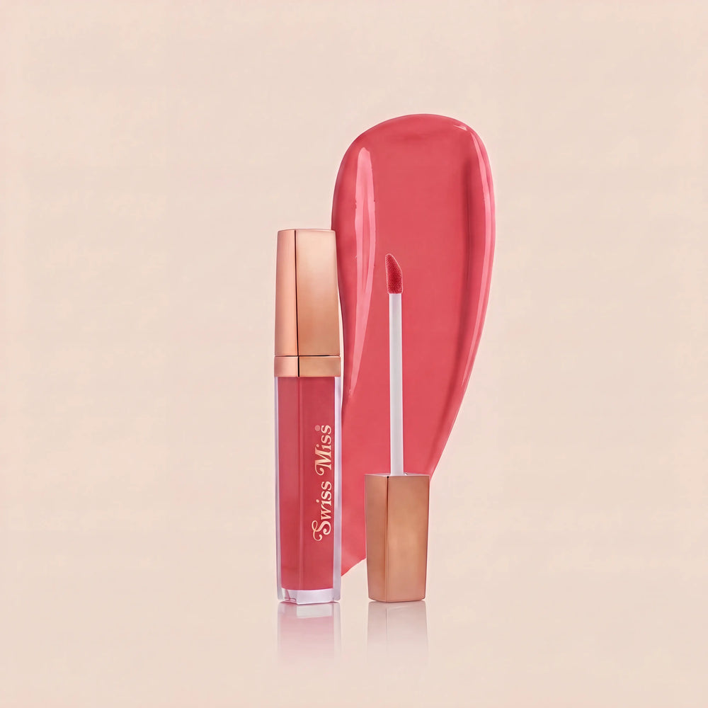 Swiss Miss High Shine Lip Gloss in shade 105 Candy Pop featuring rose gold cap, applicator wand, and vibrant candy pink lip gloss swatch.
