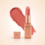 Swiss Miss Silk Matte Lipstick in shade Coral Ice 727 featuring sleek rose gold metallic square tube casing with a warm peach coral pink lipstick swatch.