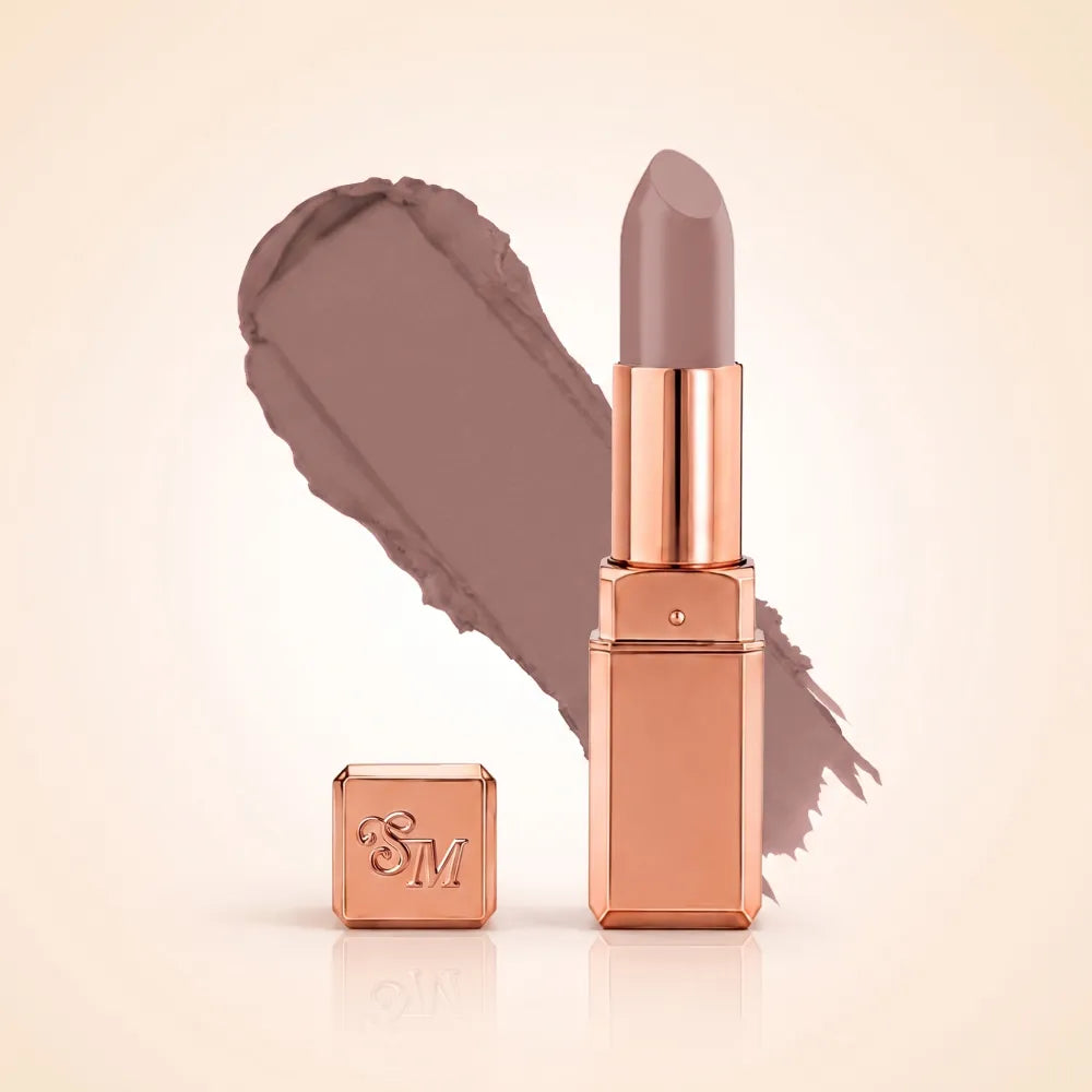 Swiss Miss Silk Matte Lipstick in shade Desert Taupe 711 featuring sleek rose gold metallic square tube casing with a cool nude desert taupe lipstick swatch.