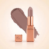 Swiss Miss Silk Matte Lipstick in shade Desert Taupe 711 featuring sleek rose gold metallic square tube casing with a cool nude desert taupe lipstick swatch.
