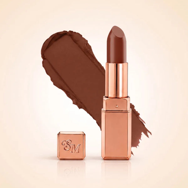Swiss Miss Silk Matte Lipstick in shade Espresso 730 featuring sleek rose gold metallic square tube casing with a rich deep chocolate brown espresso lipstick swatch.