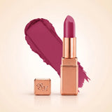 Swiss Miss Silk Matte Lipstick in shade Fuchsia 719 featuring sleek rose gold metallic square tube casing with a bright deep fuchsia magenta pink lipstick swatch.