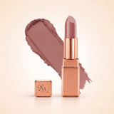 Swiss Miss Silk Matte Lipstick in shade So Plum 720 featuring sleek rose gold metallic square tube casing with a muted soft plum mauve nude lipstick swatch.