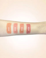 Arm swatches comparing Swiss Miss lipstick shades B101, B102, B103, and B104.