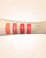 Arm swatches comparing Swiss Miss lipstick shades B113, B114, B115, and B116.