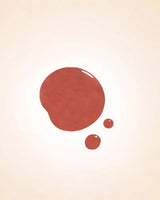 Color swatch drop of Swiss Miss Autumn Blaze shade F-408 quick dry nail polish.