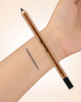 Swiss Miss Eye Pencil in shade 01 Black resting on a forearm with a single line pigment swatch.