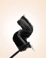 Rich black mascara texture swatch applied with a wand brush demonstrating the smooth, clump-free formula of Swiss Miss Mascara.