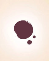 Glossy dark plum blossom pink liquid nail polish drop swatch in shade 247 showing coverage and finish.