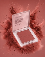 Swiss Miss Flawless Match single powder blush compact open in shade Glamorous Rose SM 002 set against a dusty rose powder explosion background.