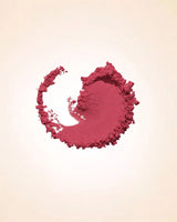 Circular smudged powder swatch displaying the deep berry tone and matte finish of Swiss Miss Blush in Grace Berry SM 004.