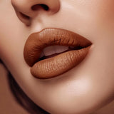 Close-up of lips wearing Swiss Miss Cashmere Brown B-112 matte lipstick shade.