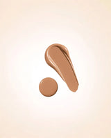 Liquid foundation smear swatch and drop of Swiss Miss Matte and Poreless CC Foundation in shade Almond SM 05