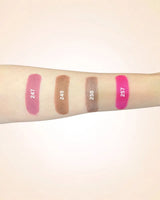Forearm swatches comparing Swiss Miss Classic Lipstick shades 247, 249, 250, and 257.