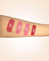 Forearm swatches comparing Swiss Miss Classic Lipstick shades 259, 263, 271, and 284.