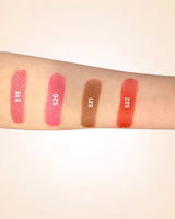 Forearm color swatches comparing Swiss Miss Classic Lipstick shades 519, 520, 521, and 522.