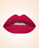 Lip application swatch of Swiss Miss Classic Lipstick shade Cherry Berry M-18 displaying a rich berry lip finish.