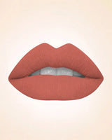 Close-up lip swatch of Swiss Miss Classic Lipstick in Cocoa Crush M-518 shade.
