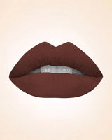 Close-up lip swatch of Swiss Miss Classic Lipstick in Dark Chocolate M-223 shade.