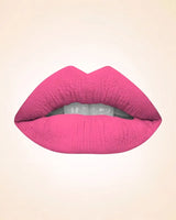 Close-up lip swatch of Swiss Miss Classic Lipstick in Flamingo Funk M-525 shade.