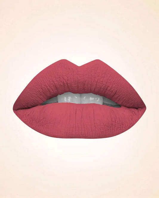 Close-up lip swatch of Swiss Miss Classic Lipstick in Flamingo Pink M-228 shade.