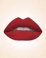 Close-up lip swatch of Swiss Miss Classic Lipstick in Garnet Glam M-511 shade.
