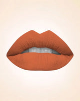 Lip swatch model view showing Swiss Miss Classic Lipstick in Honey Haze M-512.