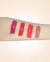 Arm swatches of Swiss Miss Classic Lipsticks featuring shades 018, 024, 039, and 050 on fair skin tone.