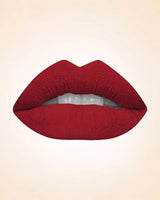 Close-up lip swatch of Swiss Miss Classic Lipstick in True Maroon M-284 shade.