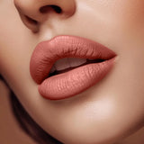 Close-up of lips wearing Swiss Miss Deep Rose B-104 matte lipstick shade.