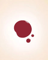 Glossy deep rose red liquid nail polish drop swatch in shade Gypsy Rose 222 showing coverage and finish.
