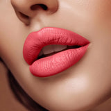 Close-up of lips wearing Swiss Miss Hot Pink B-109 matte lipstick shade.