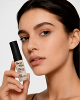 Model holding Swiss Miss Matte and Poreless CC Concealer in shade Fine Plush SM 03