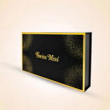 Closed black Swiss Miss perfume gift box featuring gold foil branding and elegant corner glitter accents.