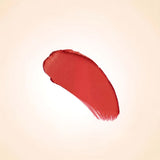 Bright vibrant red texture swatch of Swiss Miss Red Diva B-116 lipstick on a neutral background.