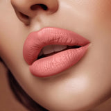 Close-up of lips wearing Swiss Miss Romantic Pink B-106 matte lipstick shade.
