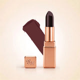 Swiss Miss Silk Lipstick in shade Deep Cherry (710) in gold bullet packaging shown alongside a textured cream color swatch.