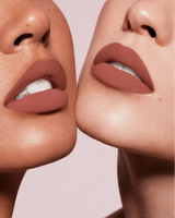 Close-up shot of two models with different skin tones wearing Swiss Miss Silk Lipstick in shade Rich Roast (731).