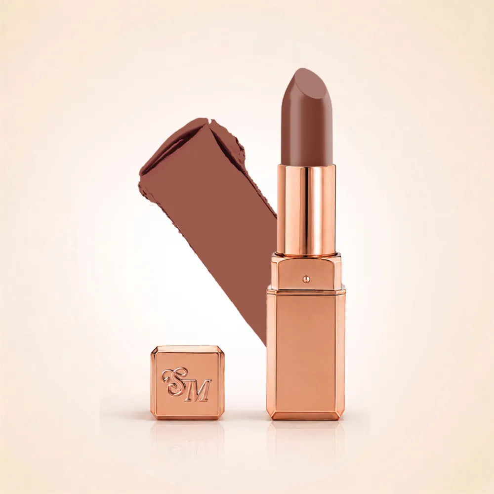 Swiss Miss Silk Lipstick in shade Rich Roast (731) in gold bullet packaging shown alongside a textured cream color swatch.