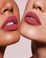 Close-up shot of two models with different skin tones wearing Swiss Miss Silk Lipstick in shade Velvet Blush (712).