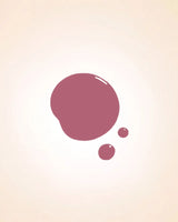 Glossy liquid nail polish drop swatch in shade Sugar Pink 209 showing texture and coverage.