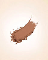Smudged powder streak swatch demonstrating the fine texture and medium almond shade coverage of Swiss Miss Compact Powder in Almond SM 04.